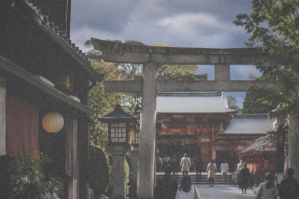 The stone gate and grounds of Yasaka Shrine at the eastern end of Shijo Street
