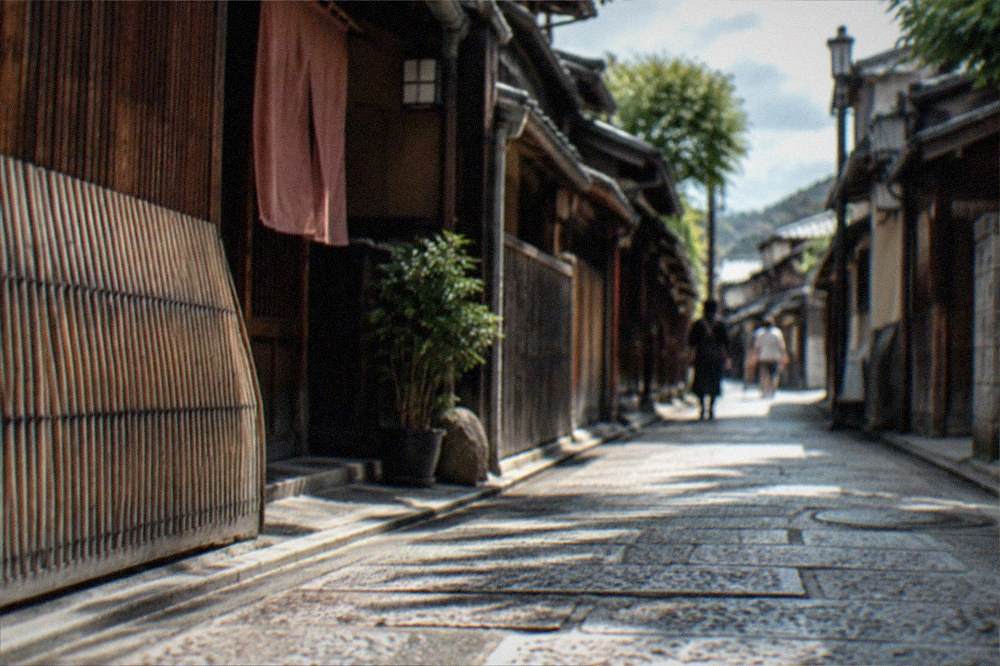 A quiet narrow wooden alley in the Gion district closed to photography