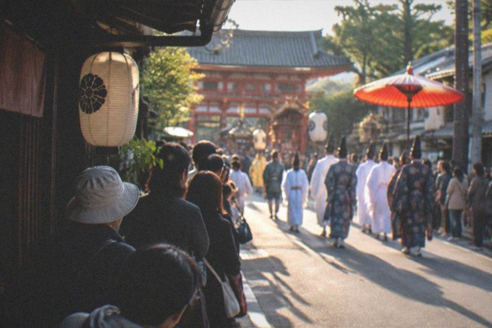 Crowds gathered along a Kyoto street waiting for a festival procession