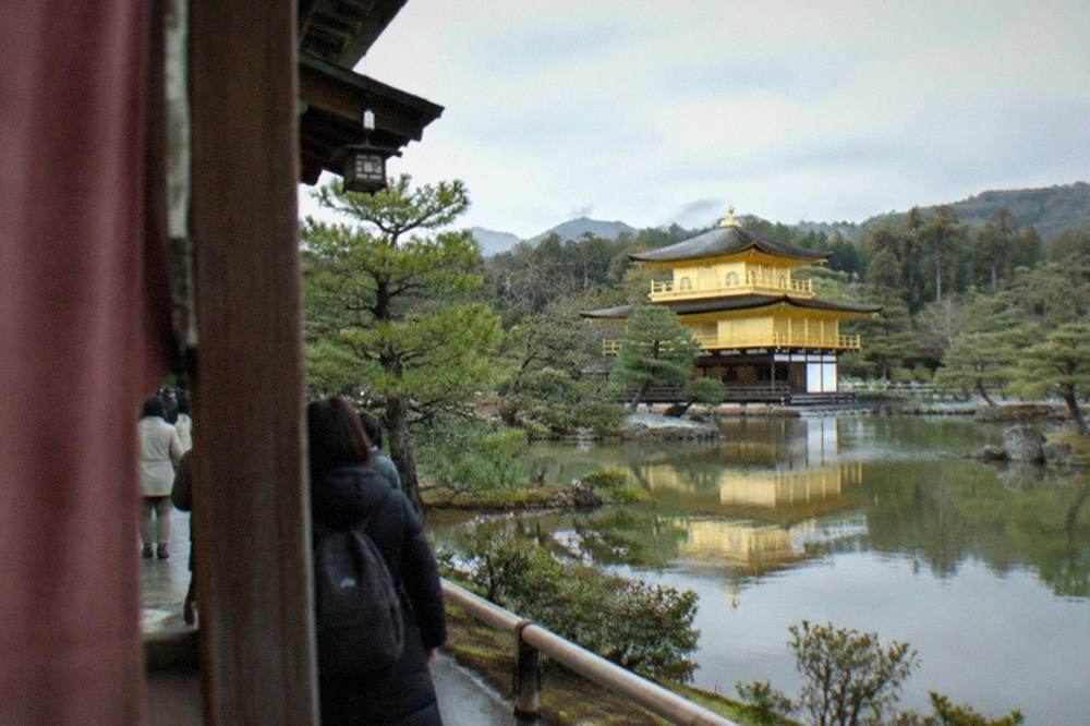 The golden pavilion of Kinkaku-ji reflected in its pond in Kyoto